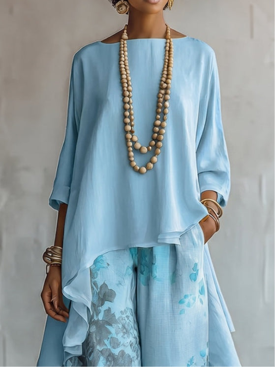Rosalía | Conjunto Completo con Top Asimétrico en Chifón y Pantalones Florales de Pierna Ancha