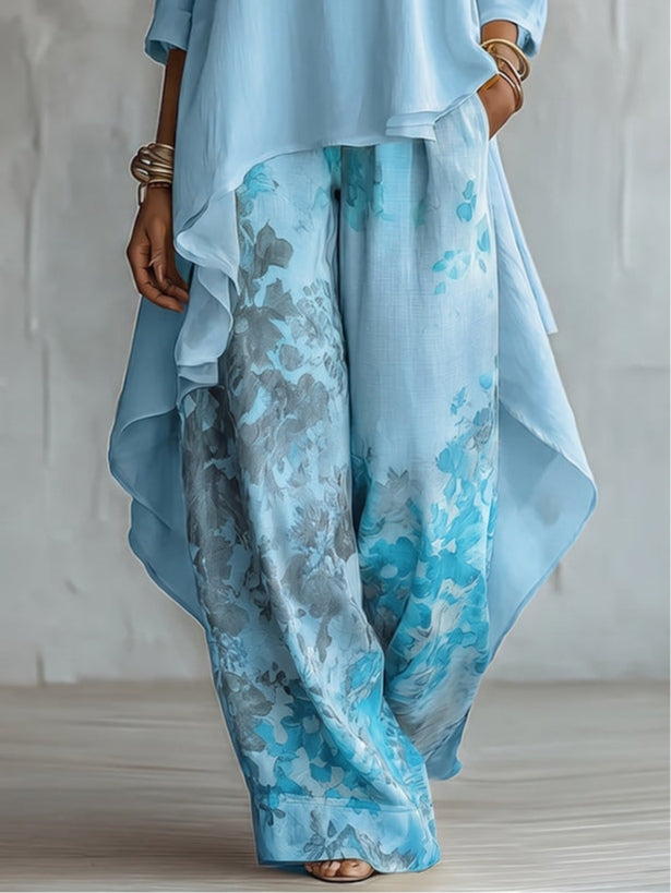 Rosalía | Conjunto Completo con Top Asimétrico en Chifón y Pantalones Florales de Pierna Ancha